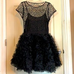 Black party dress with ruffled skirt
